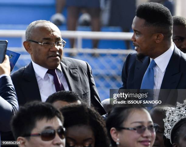 Cameroon's former international football player Samuel Eto'o and Confederation of African Football President Ahmad Ahmad attend the swearing-in...