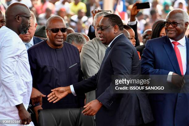 Liberia's president-elect and former football star George Weah, Ghana's former President John Dramani Mahama, Senegal's President Macky Sall and...