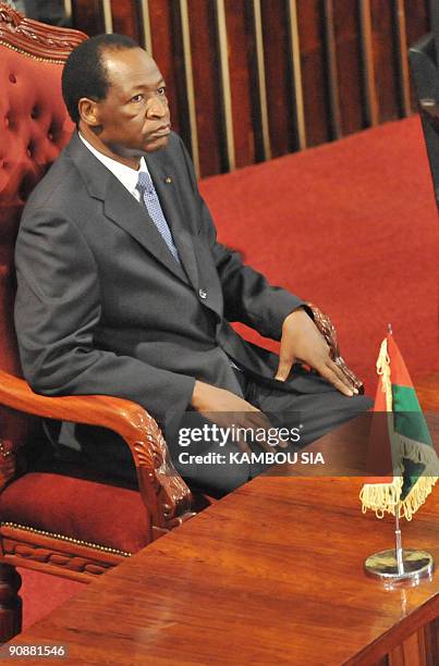 Burkinabe President Blaise Compaore sits in the Ivory Coast National assembly on September 17, 2009 in Abidjan. Compaore is on a three day official...