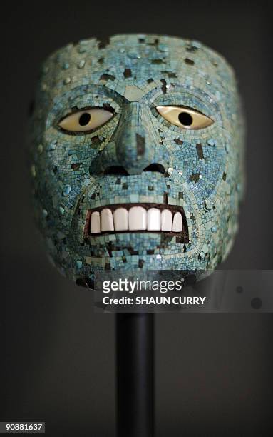 Turquoise mask dating from 1400-1521 is pictured at the 'Moctezuma Aztec Ruler' exhibition at the British museum in central London, on September 17,...