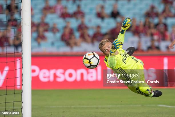 January 19: Goalkeeper Matthew Acton of the Victory dives to stop a goal during the round 17 A-League match between the Western Sydney Wanderers and...