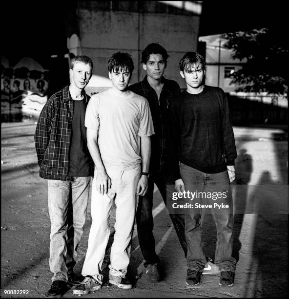 English rock group Blur pose under London's Westway, 20th July 1995. From left to right, drummer Dave Rowntree, guitarist Graham Coxon, bassist Alex...