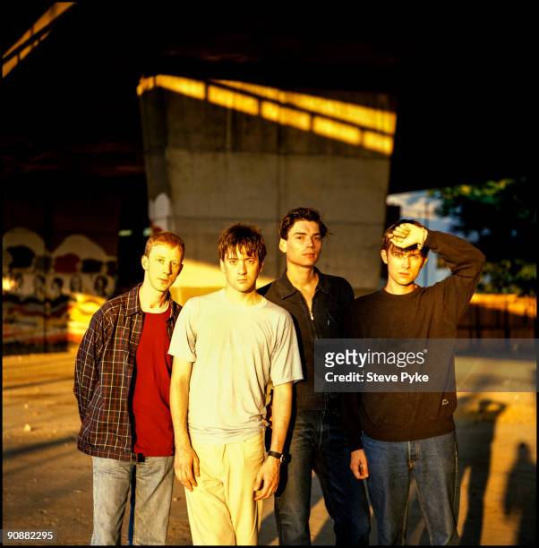 English rock group Blur pose under London's Westway, 20th July 1995. From left to right, drummer Dave Rowntree, guitarist Graham Coxon, bassist Alex...