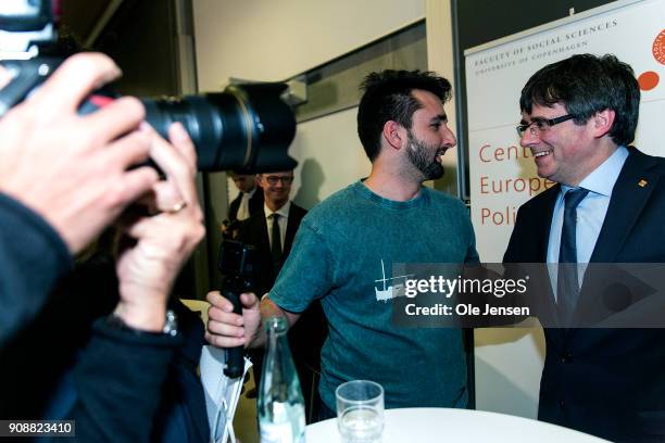 Spanish separatist leader Carles Puigdemont talks to audience at a conference at Copenhagen University, during his first visit outside Belgium since...