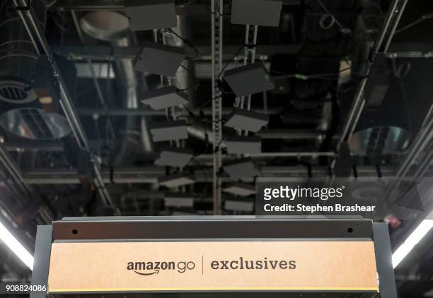 Cameras and sensors to tack shoppers purchases line the ceiling in the Amazon Go January 22, 2018 in Seattle, Washington. After more than a year in...