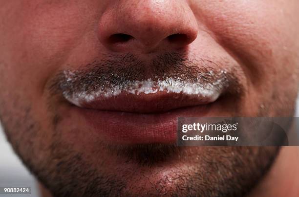 man with milk mustache  - milk moustache stock pictures, royalty-free photos & images