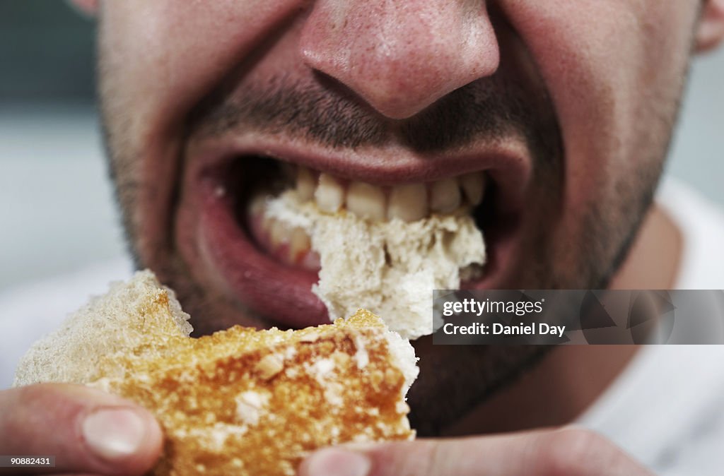 Man eating bread