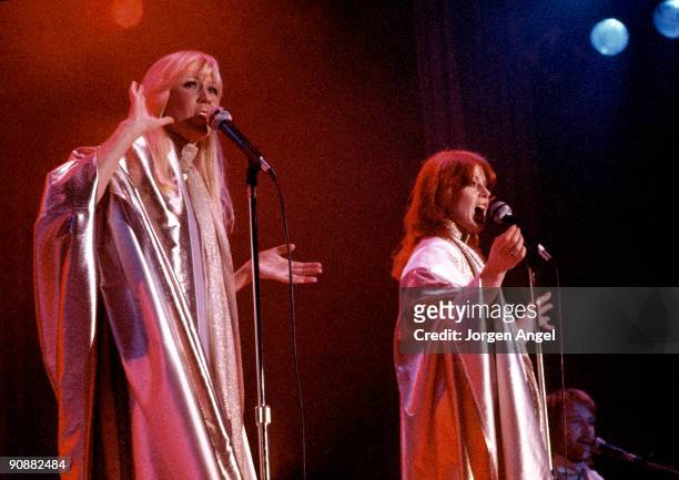 Agnetha Faltskog and Anni-Frid Lyngstad of Abba perform on stage at the Brondbyhallen on January 31st, 1977 in Copenhagen, Denmark.