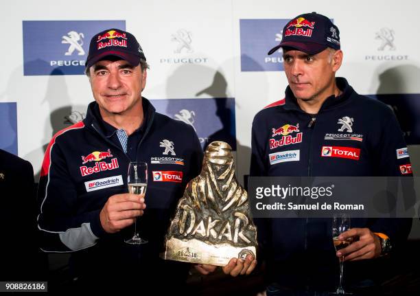 The pilot Carlos Sainz and co-driver Lucas Cruz, winners of 2018 Dakar Rally, attend a press conference at Hotel Hilton Madrid Airport on January 22,...