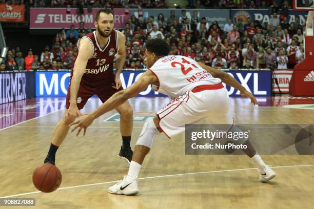 Augustine Rubit of Brose Baskets Bamberg vies Milan Macvan of Bayern Muenchen during the Quarterfinal match in the BBL Pokal 2017/18 between FC...