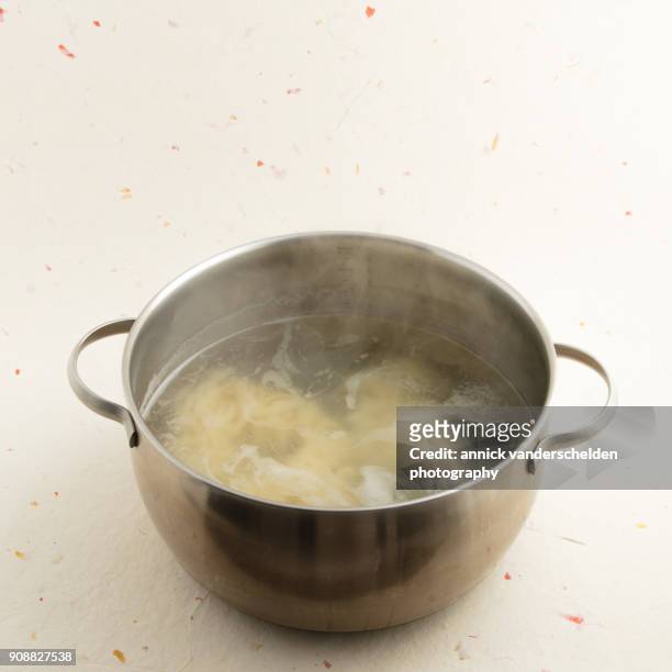 cooking noodles. - body sugars stock pictures, royalty-free photos & images