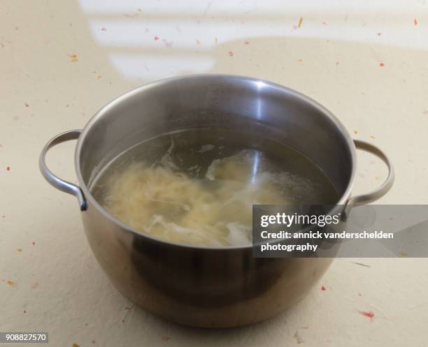 cooking noodles. - body sugars stock pictures, royalty-free photos & images