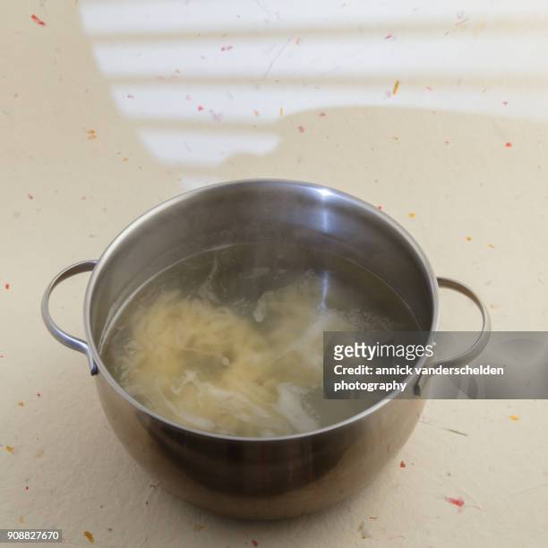 cooking noodles. - body sugars stock pictures, royalty-free photos & images