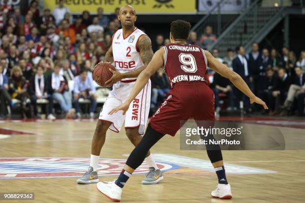 Jared Cunningham of Bayern Muenchen vies Luka Mitrovic of Brose Baskets Bamberg during the Quarterfinal match in the BBL Pokal 2017/18 between FC...