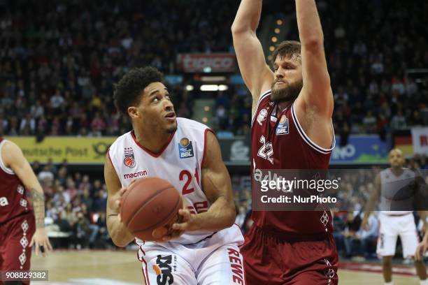 Danilo Barthel of Bayern Muenchen vies Augustine Rubit of Brose Baskets Bamberg during the Quarterfinal match in the BBL Pokal 2017/18 between FC...