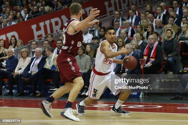 Anton Gavel of Bayern Muenchen vies Maodo Loe of Brose Baskets Bamberg during the Quarterfinal match in the BBL Pokal 2017/18 between FC Bayern...