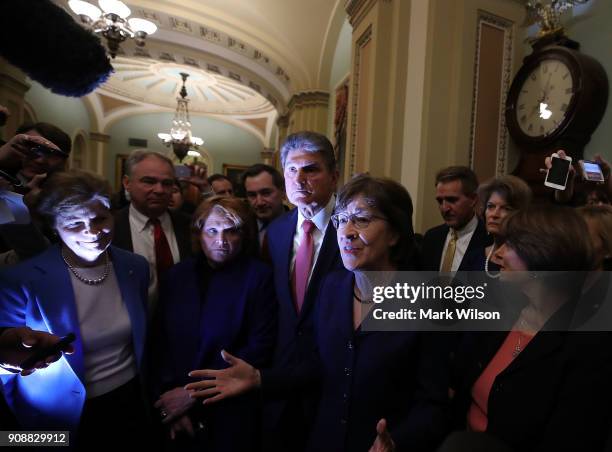 Sen. Susan Collins , speaks while flanked by other Senators after the Senate voted and passed a CR to reopen the government, at the U.S. Capitol on...