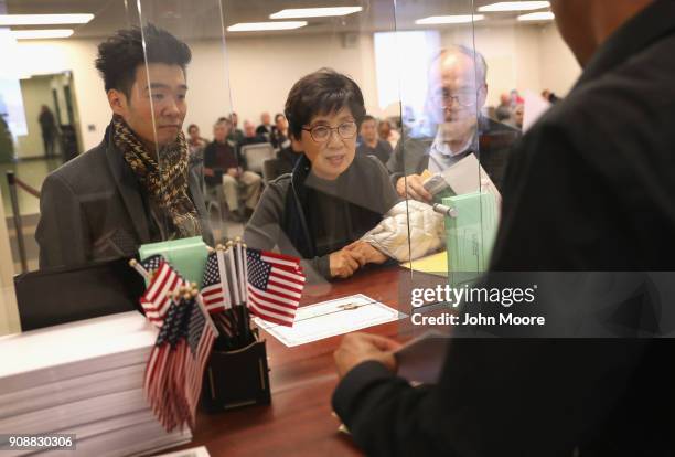 Immigrants prepare to become American citizens at a naturalization service on January 22, 2018 in Newark, New Jersey. Although much of the federal...