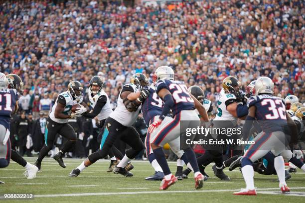 Playoffs: Jacksonville Jaguars QB Blake Bortles in action, handing off to Leonard Fournette vs New England Patriots at Gillette Stadium. Foxborough,...