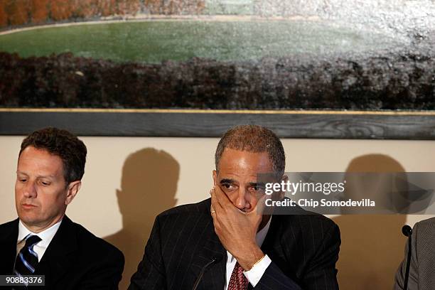 Treasury Secretary Timothy Geithner and Attorney General Eric Holder attend a meeting with attorneys general from 12 states about combating fraud in...