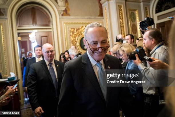 Senate Minority Leader Chuck Schumer leaves a meeting with Senate Democrats on Capitol Hill, January 22, 2018 in Washington, DC. Lawmakers are...