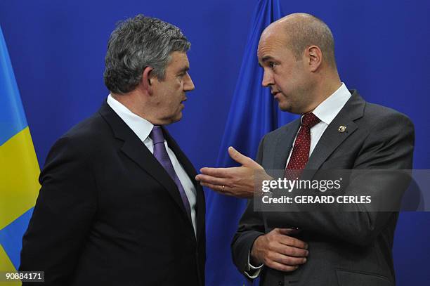 Swedish Prime Minister Fredrik Reinfeldt , whose country holds the rotating EU presidency welcomes British Prime Minister Gordon Brown ahead of a...