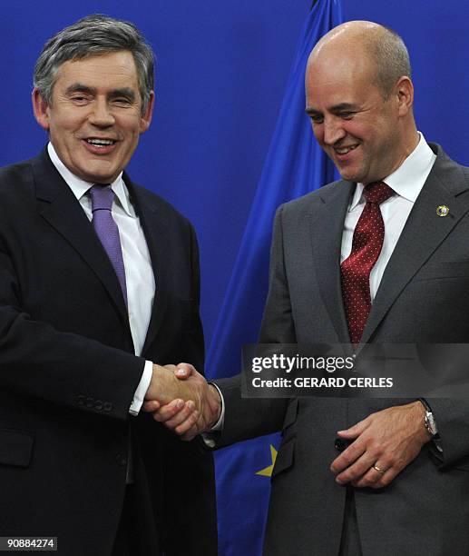 Swedish Prime Minister Fredrik Reinfeldt , whose country holds the rotating EU presidency welcomes British Prime Minister Gordon Brown ahead of a...