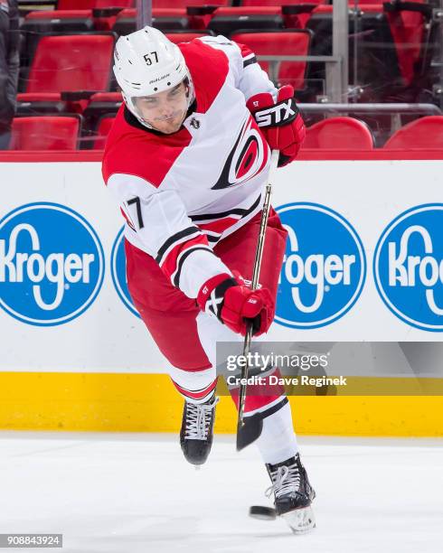 Trevor van Riemsdyk of the Carolina Hurricanes shoots the puck during warm-ups prior to an NHL game against the Detroit Red Wings at Little Caesars...