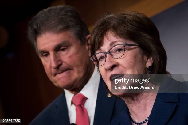 Sen. Joe Manchin and Sen. Susan Collins speak during a press conference after the Senate passed a procedural vote for a continuing resolution to fund...