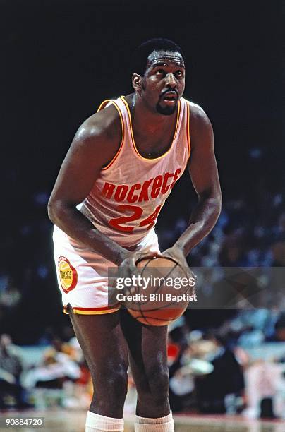 Moses Malone of the Houston Rockets shoots during a game played in Houston, Texas. NOTE TO USER: User expressly acknowledges and agrees that, by...