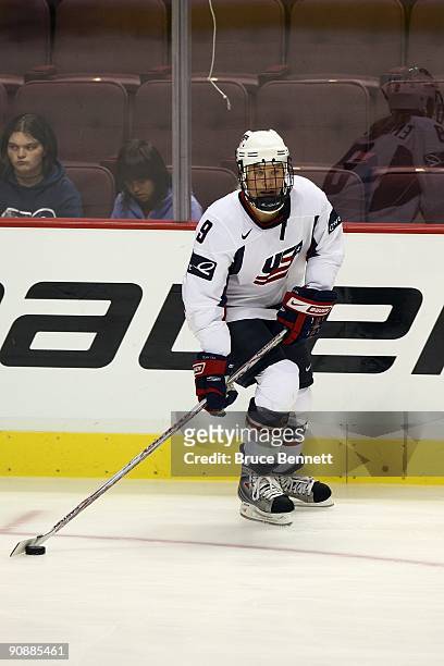 Molly Engstrom of Team USA skates with the puck against Team Canada during the Hockey Canada Cup at General Motors Place on September 3, 2009 in...