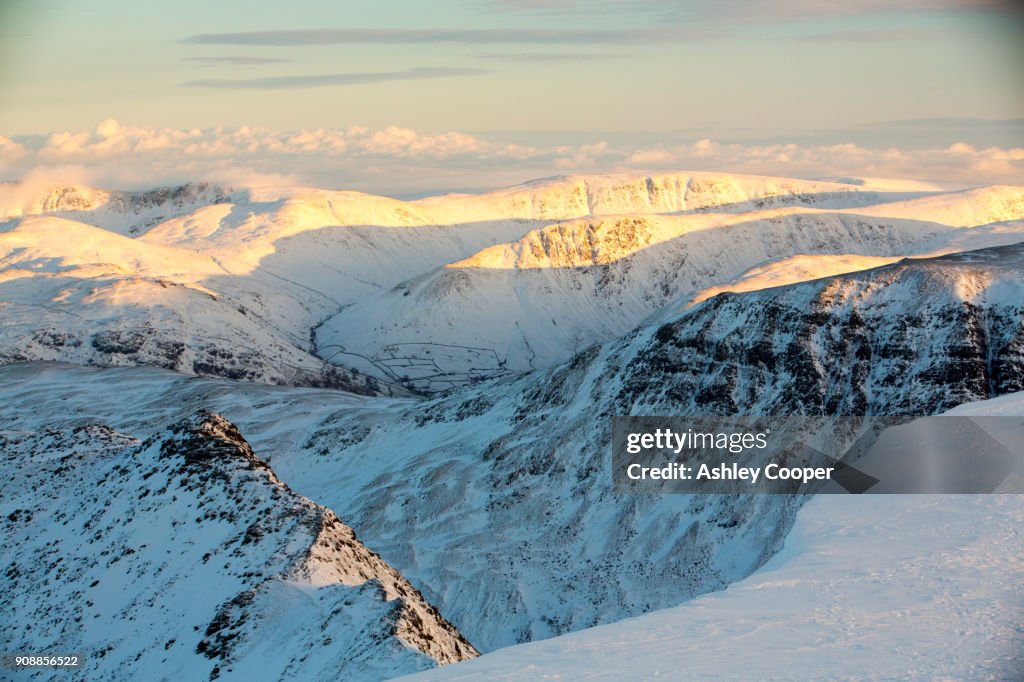 Mountaineers on Striding Edge from Helvellyn, Lake District, UK