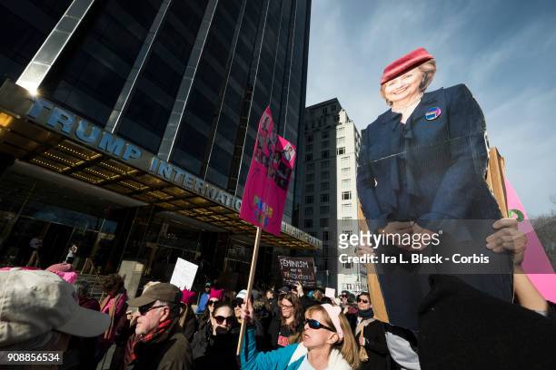 Demonstrator marchs a likeness of Hillary Clinton in front of Trump International Hotel and Tower during the second annual Women's March in the...