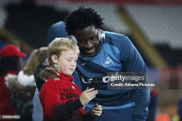 Wilfried Bony of Swansea City arrives at Liberty Stadium prior to kick off of the Premier League match between Swansea City and Liverpool at the...