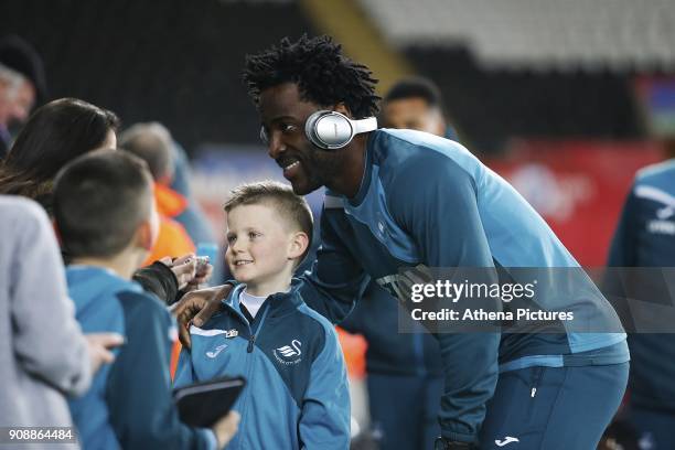 Wilfried Bony of Swansea City arrives at Liberty Stadium prior to kick off of the Premier League match between Swansea City and Liverpool at the...