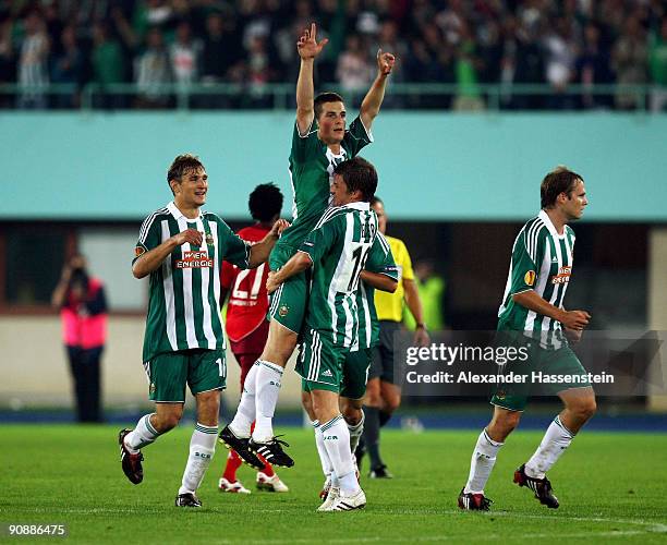 Veli Kavlak of Vienna celebrates scoring his team's third team goal with his team mate Hannes Eder during the Europa League match between SK Rapid...