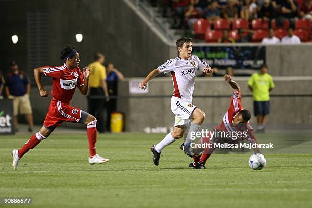 Will Johnson of Real Salt Lake goes after the ball against Mike Banner of Chicago Fire at Rio Tinto Stadium on September 12, 2009 in Sandy, Utah.