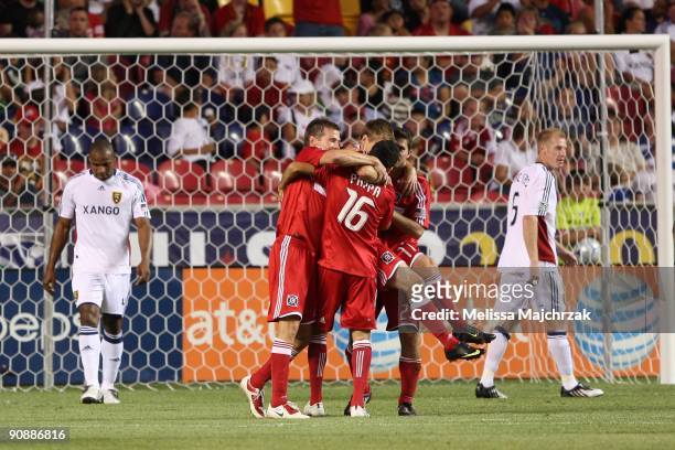 Chris Rolfe and teammates of Chicago Fire celebrate after kicking the goal against the Real Salt Lake at Rio Tinto Stadium on September 12, 2009 in...