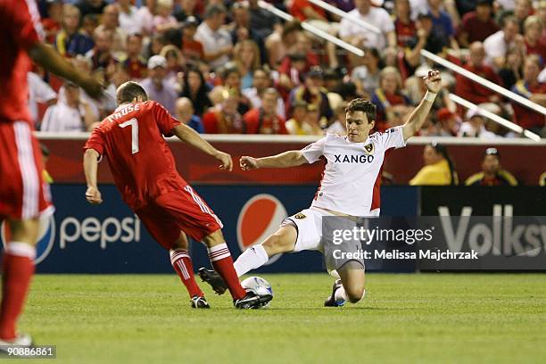 Will Johnson of Real Salt Lake goes down for the ball against Logan Pause of Chicago Fire at Rio Tinto Stadium on September 12, 2009 in Sandy, Utah.