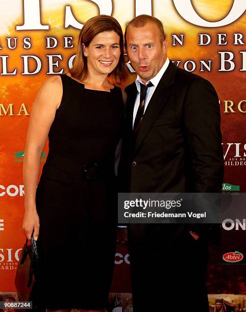 Marie-Jeanette Ferch and Heino Ferch pose on the red carpet before the premiere of the film 'Vision - From The Life Of Hildegard Von Bingen' by...