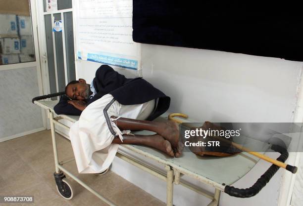 Yemeni patient waits to receive kidney dialysis treatment on January 22, 2018 at a clinic in the country's Hajjah province. More than three-quarters...