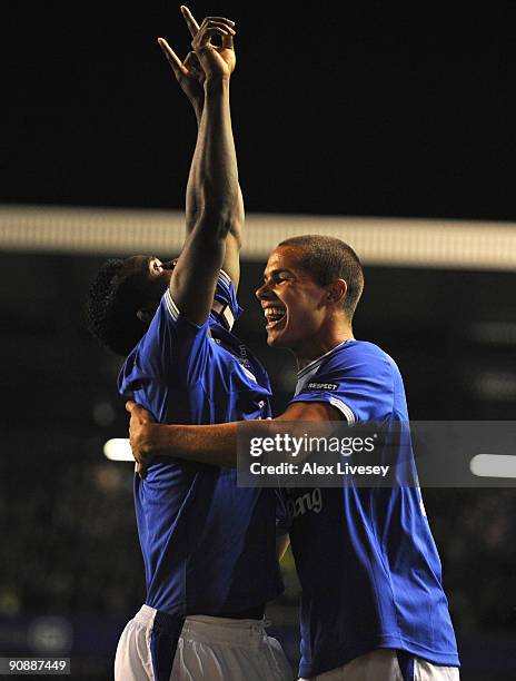 Joseph Yobo of Everton celebrates with Jack Rodwell after scoring the opening goal during the UEFA Europa League Group I match between Everton and...