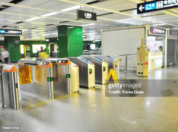 barrier gate in subway. - entering turnstile stock pictures, royalty-free photos & images