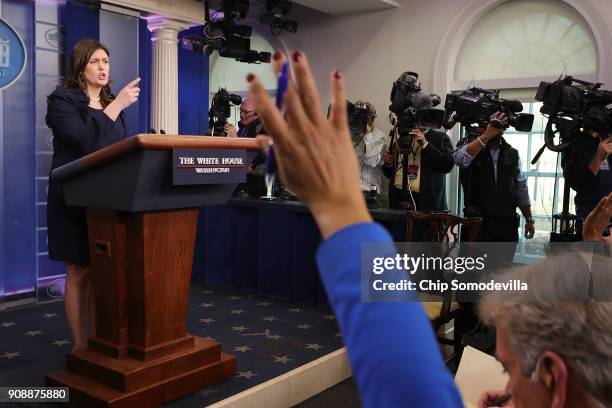 White House Press Secretary Sarah Huckabee Sanders calls on reporters during a news conference in the Brady Press Briefing Room at the White House...