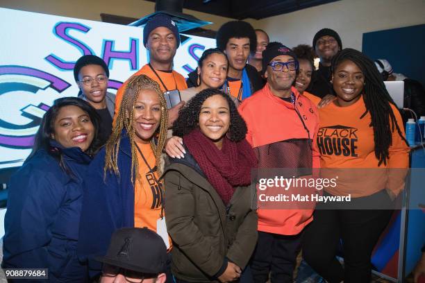 Filmmaker Spike Lee poses for a photo with the Blackhouse team during the "She's Gotta Have It" brunch sponsored by Netflix at Buona Vita on January...