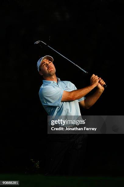 Aaron Oberholser chips onto the 1st green during the first round of the Albertson's Boise Open at Hillcrest Country Club on September 17, 2009 in...