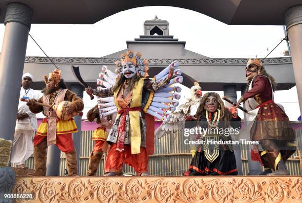 Tableaux artist from Assam performs Traditional Masks of the Satras of Assam during a press preview of tableaux participating in Republic Day Parade...