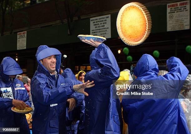 Jimmie Johnson takes part in the Largest Custard Pie fight during Guinness World Record Breaker Week on "LIVE! with Regis and Kelly" during NASCAR...