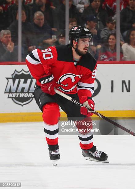 Marcus Johansson of the New Jersey Devils skates during the game against the Washington Capitals at Prudential Center on January 18, 2018 in Newark,...
