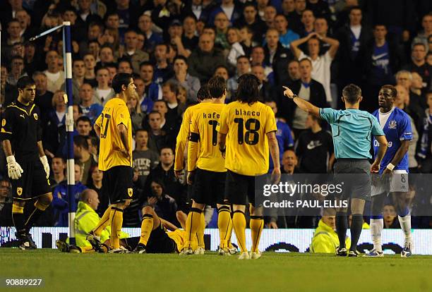 Everton's French forward Louis Saha is sent off against AEK Athens during their UEFA Europa League football match at Goodison Park in Liverpool,...